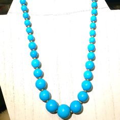 Bold Solid Sky Blue Magnesite Turquoise, No Matrix Solid Sky Blue Graduated Round Beads. Vibrant And Classy Blue Wooden Beads Round Jewelry, Blue Wooden Round Beads Jewelry, Blue Wooden Beaded Round Jewelry, Elegant Large Beads Turquoise Necklace, Elegant Turquoise Necklace With Large Blue Beads, Elegant Blue Turquoise Necklace With Large Beads, Elegant Blue Jewelry With Wooden Beads, Blue Polished Beads Beach Jewelry, Blue Polished Beads For Beach