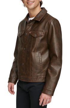 Bring a bit of rock 'n' roll to your day-to-day with this classic trucker jacket updated with a sleek faux-leather fabrication. 25 1/2" length (size medium) Spread collar Button cuffs Lined 100% polyurethane Machine wash, tumble dry Imported Casual Leather Denim Jacket For Fall, Leather Trucker Jacket, Brown Fits, Fabric Gift Bags, Trucker Jacket, Nordstrom Store, Fabric Gifts, Free Fabric, Levi's