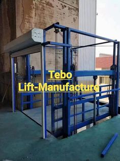 a large machine with the words tebo lift - manufacture on it