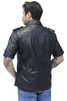 Men's short sleeve leather shirt in soft lambskin leather now with inside concealed carry pockets and more military uniform styling. A men's leather shirt has heavy duty snaps up font, epaulets on each shoulder and a leather shirt collar. This snap-up leather t shirt comes with two snap flap chest pockets, a long body that keeps the draft from up the back and a soft nylon lining. Keep cool and look dapper in this cool premium quality leather shirt exclusively from Jamin Leather. This shirt is ideal for TALL men as well. Sizes: S, M, L, XL, 2X, 3X. +$10 for 2X-3X. [4#] MS2300K military uniform styling dual inside concealed pockets short sleeve snap front snap flap chest pockets soft nylon lining top grain leather soft lambskin leather Jamin Leather® Exclusive IMPORTANT SPECIFICATIONS: EXCLU Leather Button-up Top With Pockets, Leather Collared Top With Pockets, Uniform Styling, Mens Leather Shirt, Leather T Shirt, Tall Men, Uniform Shirts, Leather Travel Bag, Looking Dapper