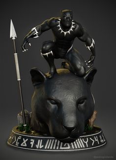 a statue of a man riding on the back of a black bear with an arrow