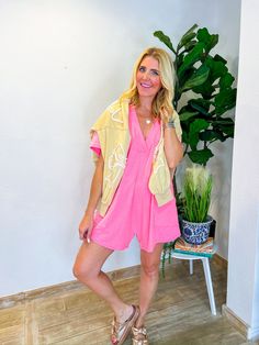 This neon orange stunner is your go-to for a pop of vibrant color and effortless style. With its stretchy, slouchy fit and lightweight, soft cotton fabric, it’s a fabulous dupe for those sought-after Free People looks. Perfect for a sunny day at the beach or a casual brunch with friends, this romper features handy side pockets and a chic raw edge that adds a touch of laid-back flair. Ideal for long-waisted or taller girls, the oversized fit ensures you'll be comfortable and stylish no matter the Coral Spring Beach Tops, Vibrant Cotton Tops For Spring, Neon Trendy Tops For Spring, Casual Neon Tops For Summer, Casual Neon Tops For Spring, Orange Spring Loungewear Top, Orange Loungewear Top For Spring, Vibrant Relaxed Fit Tops, Swimsuit Jewelry