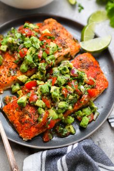 salmon with avocado salsa on a plate