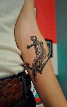 an anchor tattoo on the arm