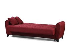 a red couch sitting on top of a white floor