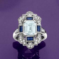 Ross-Simons - 1.70ct Aquamarine, .50ct t. w. Sapphire Ring, .50ct t. w. White Zircons. Size 5. Bring a cooling touch to your outfit with our sparkling ring. A central 1.70 carat emerald-cut aquamarine shimmers, sided with .50 ct. t. w. sapphire baguettes. Dazzling .50 ct. t. w. white zircon rounds are elegantly arranged throughout. Crafted in sterling silver with milgrain details. 1" wide. White zircon, sapphire and aquamarine ring. Aquamarine birthstones are the perfect gift for March birthdays March Birthdays, Aquamarine Birthstone, March Birthday, Sparkling Rings, Aquamarine Ring, Aquamarine Rings, Emerald Cut, Aquamarine, Sapphire Ring