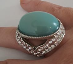 Beautiful vintage silvwr toned statement ring. Large teal blue  gem. Ring size UK Q US 8 Ideal and unique gift Item comes beautifully gift wrapped ready to gift to your loved one Turquoise Party Ring, Elegant Turquoise Crystal Ring Gift, Elegant Turquoise Ring For Party, Blue Turquoise Ring Perfect As Gift, Oval Rings With Sparkling Stones For Gift, Elegant Turquoise Ring With Large Stone For Gift, Elegant Turquoise Ring With Accent Stones For Gifts, Elegant Turquoise Ring With Accent Stones As Gift, Handmade Blue Rings For Party