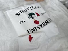 Christmas Sweatshirt, Christmas Whoville University Embroidered Sweatshirt, Christmas Embroidery Sweatshirt, Christmas Crewneck 90% cotton, 10% polyester * Unisex Hoodies fits men & women great. * All sizes are available in the following (S, M, L, XL, 2X, 3X) If needed larger or smaller please send us a quick email to get it in stock for you. * Your custom Artwork/LOGO is digitally digitized and embroidered with best in class embroidery machines. * THE PERFECT GIFT: Many of our designs make thes White Top With Embroidered Logo For Christmas, White Tops With Embroidered Logo For Christmas, White Hoodie With Embroidered Text For Winter, Winter White Hoodie With Embroidered Text, White Winter Hoodie With Embroidered Text, Christmas Whoville, Whoville University, Christmas Crewneck, University Sweatshirts