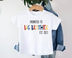 Big Brother t-shirt T-shirt is 100% cotton.  We design & print our products with care & love! We use the best quality vinyls, inks & transfers on all products. * * * * * * * * * * * * * * * * * * * * * * * * * * * * * CARE INSTRUCTIONS: Wash inside out on gentle wash, Do not tumble dry. * * * * * * * * * * * * * * * * * * * * * * * * * * * * * SHIPPING: We want to get your product to you as quickly as possible, your purchase will be shipped through Australia post, Express post is available for selection. * * * * * * * * * * * * * * * * * * * * * * * * * * * * * GUARANTEE: We stand behind our products with a 100% guarantee; if you are unsatisfied with our product, please let us know & we will rectify any issues. We are unable to refund products due to change of mind or those that are person White T-shirt With Name Print For Gender Reveal, Short Sleeve T-shirt With Name Print For Gender Reveal, Gender Reveal T-shirt With Name Print, White Letter Print T-shirt For Gender Reveal, Crew Neck T-shirt For Gender Reveal With Text Print, Big Brother Pregnancy Announcement, Big Brother Tshirt, Promoted To Big Brother, Big Brother Shirt