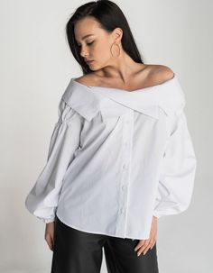 Blouse of a flat silhouette, with open shoulders, made of shirting fabric.Along the neckline, there is a beautiful turn-down collar that fastens with two hidden buttons.Front fastening with buttons, long sleeve with elastic.Product parameters:XS: waist - 57.5 cm, hips - 58.8 cmS: waist - 59.5 cm, hips - 60.8 cmM: waist - 61.5 cm, hips - 61.8 cmML: waist - 63.5 cm, hips - 63 cmL: waist - 65.5 cm, hips - 64 cmThe length of the product on the back is 72 cm. Sleeve length - 68 cm. The model is weari Chic Summer Blouse With Fold Down Collar, Chic Fold Down Collar Summer Blouse, Chic Fold Down Collar Blouse For Summer, Summer Fitted Blouse With Collar, Fitted Summer Blouse With Fold Down Collar, Summer Daywear Tops With Fold Down Collar, Spring Daywear Blouse With Fold Down Collar, Blouse With Buttons And Fold Down Collar, Summer Blouse With Button Closure And Fold Down Collar