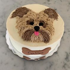 a cake with a dog's face on it