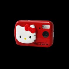 a red camera with a hello kitty face on it