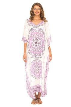 The beautiful long caftan dress is so comfortable and lightweight. The mandala design is embroidered with sequins to add dazzle to this already beautiful lounge dress. Get ready to be stylish and comfortable. Fits sizes petite up to 2X. Semi-sheer lightweight fabric Sequins added by hand Mandala design Soft 100% rayon Hand wash cold, hang to dry White Festive Maxi Dress For Beach, Festive White Maxi Dress For Beach, Festive White Maxi Dress For The Beach, White Bohemian Maxi Dress For Eid, Bohemian Flowy Kaftan For Eid, White Bohemian Kaftan With Relaxed Fit, White Bohemian Relaxed Fit Kaftan, White Relaxed Fit Bohemian Kaftan, Bohemian Floor-length Kaftan For Eid