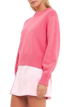 A relaxed, slightly oversized fit adds to the cozy vibes of this playfully pink cotton-blend sweater knit with ribbed trim. Crewneck Long sleeves Ribbed cuffs and hem 50% cotton, 30% acrylic, 20% wool Hand wash, dry flat Imported Pink Relaxed Fit Crew Neck Sweater, Pink Crew Neck Fall Sweater, Pink Crew Neck Sweater For Fall, Casual Pink Sweater With Ribbed Cuffs, Pink Crew Neck Sweater With Ribbed Cuffs, Pink Cotton Sweater With Ribbed Collar, Cozy Pink Sweater With Ribbed Cuffs, Pink Crew Neck Sweater With Ribbed Neckline, Spring Relaxed Fit Sweater With Ribbed Cuffs