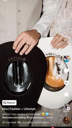 a man and woman standing next to each other in front of a white guitar case