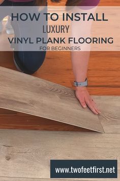 a woman kneeling down on the floor to install vinyl planks