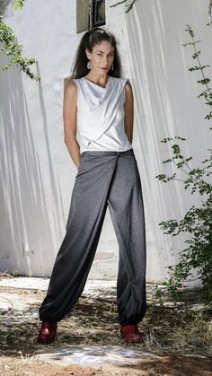 One of our Bestsellers item!!  4 Way Women Wrap Pants - Versatile pants that can be changed by playing with the wings and Velcro closure.  Details: * Balloon shaped the bottom of trousers. (elastic strap) * Zipper at the back. * Wings can be attached to the front, to the back or one wing is attached Samurai Pants, Convertible Pants, Wrap Pants, Womens Pants, Maternity Pants, Pantalon Large, Loose Pants, Grey Pants, Wide Pants