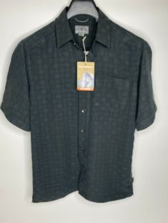 Men’s Royal Robbins San Juan Dry Relaxed Fit Button Up Shirt •Size S Total length 28” •Armpit to armpit 20” NWT. Condition is "New with tags". Shipped with USPS First Class. Wrinkle resistant •UPF50+ • TempraTech temperature control 97% modal 3% other fibers Gray-Black New with tags Relaxed Fit Rugged Button-up Tops, Elegant Rayon Button-up Shirt, Solid Rayon Button-up Shirt, Military Button-up Shirt, Button-up Rayon Shirt With Button Closure, Royal Robbins, Button Up Shirt, Temperature Control, First Class