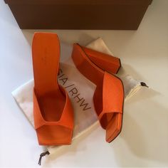 Gia Borghini X Rhw Square Toe Mule Heels Orange 40 Nib $475 New ! Size 40 Gia Borghini X Pernille Teisbaek Collaboration Linen Upper With Leather Sole Made In Italy Square Toe With Angled Block Heel Approx 100mm/ 4 Inch Wedge Our Style No. Gghf-Wz132 Manufacturer Style No. Rosie 14bis 1089 Luxury Square Toe Heels For Spring, Luxury Spring Heels With Square Toe, Designer Heels For Spring Workwear, Luxury Spring Mules With Reinforced Heel, Luxury Orange Heels For Spring, Designer Block Heels With Wrapped Heel, Chic Orange Mules With Open Heel, Chic Orange High Heel Mules, Chic Orange Open Heel Mules