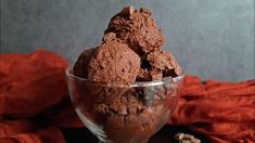 a glass bowl filled with chocolate ice cream