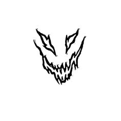 a black and white drawing of an evil monster's head with sharp fangs on it