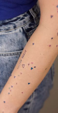 a person with a tattoo on their arm