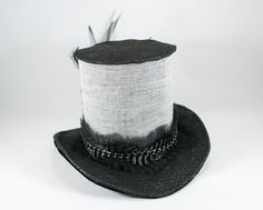 Lightweight and very easy to wear, it can easily be positioned and secured at the appropriate angle, with two alligator clips, hidden from sight. Brim made with fabric and wire so its easy to bend to adjust to head. All mini hats are about 3 1/2 inches tall and 6 inches at the base. Any outfit looks good with this mini hat, Victorian lady, Steampunk adventurer, Burlesque dancer, Mad Hatter, Renaissance or Rockabilly chick. This hat is ready to ship. Great hat for dress up! Follow me on Facebook High Crown Fitted Hat For Costume, Fitted High Crown Hat For Costumes, Fitted Brimmed Hat For Themed Events, Fitted High Crown Costume Hats For Themed Events, Fitted High Crown Hats For Themed Events, Adjustable Costume Hat For Kentucky Derby, Adjustable Hats For Kentucky Derby Costume, Fitted Brimmed Top Hat For Themed Events, Fitted High Crown Hat For Costume Party