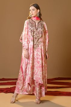 Pink kurta with floral print, handwork dabka, sequence and pearl embroidery. Paired with a coordinating painted palazzo pant and a printed dupatta. - Aza Fashions Designer Silk Kurta With Printed Motifs, Festive Floor-length Palazzo Set With Printed Motifs, Designer Silk Palazzo Set With Printed Motifs, Designer Palazzo Set With Printed Motifs For Navratri, Silk Palazzo Set With Printed Motifs For Designer Wear, Silk Sets With Printed Motifs In Maxi Length, Silk Maxi Sets With Printed Motifs, Eid Festival Printed Motifs Maxi Palazzo Set, Eid Maxi Length Palazzo Set With Printed Motifs