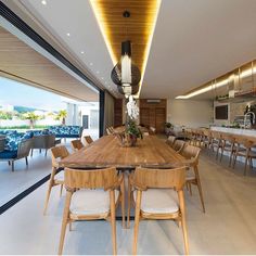 a large wooden table sitting in the middle of a room