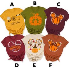 four shirts with mickey mouse and pumpkins on them