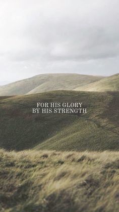 the words for his glory by his strength are in white lettering on a grassy hill