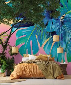 a bedroom decorated in tropical colors with palm trees and plants on the wall behind the bed