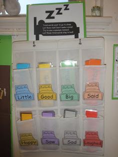 an organized classroom space with plastic bins and labels on the door to keep children occupied