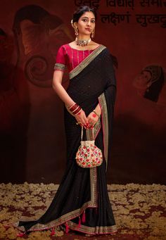 Vichitra Silk Saree with blouse in Black and Pink 4004 Desc:  Color : Black and Pink Fabric :  Vichitra silk saree Work :  Swarovski  Sequence border  Blouse work: raw silk embroidery Wash Care : Dry clean Sleeve Style : Half Sleeve Long Sleeves : Done only in Custom Stitch Sleeves Lining : Done only in Custom Stitch Bust Size : 32 to 42 Inches Occasion : Wedding   Festival   Kitty Party   Sangeet   Party Wear   Engagement   Reception   Ceremonial. With Express Free Shipping and Custom Stitching, Buy Indian Party wedding and bridal Sarees Vichitra Silk Saree with blouse in Black and Pink 4004 online in USA, UK and Canada from KollyBollyEthnics.com Pink Saree Styling, Black And Pink Saree, Bridesmaid Sarees, Lehenga Choli Wedding, Indian Designer Sarees, Designer Sarees Collection, Blouse Silk, Indian Sarees Online, Half Sleeve Blouse