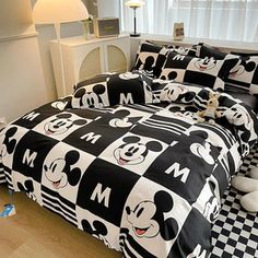 mickey mouse bedding set with black and white checkerboard pattern on the sheets