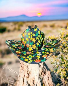 Eve is inspired from Caroline Constas's stunning floral dress. Hard canvas cowboy hat, with a hand-painted flowers adorning the entire hat. Proudly American Made. Our hats are manufactured in Mexico and details added by hand in Los Angeles, CA using the highest quality materials. SIZING S/M 19in-22.75in | 48cm-57.5cm L/XL 19.5in-23.25in | 49.5cm-59cm **Please allow up to 2 weeks for production and shipping.** If you need your order rushed, please send us an email. We can almost always accommodate rushed orders at no additional cost.* CUSTOM OPTIONS AVAILABLE. Multicolor Curved Brim Sun Hat For Rodeo, Multicolor Spring Rodeo Hat, Artisan Fitted Hats For Country Events, Multicolor Western Hats For Kentucky Derby, Western Multicolor Hats For Kentucky Derby, Western Style Multicolor Hats For Kentucky Derby, Fitted Country Style Hat For Festivals, Artisan Fitted Summer Hat Bands, Multicolor Western Hat For Rodeo