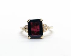 Don't miss this opportunity to own this beautiful gemstone ring crafted in 14k gold filled => Gemstone Type - Garnet, Clear Quartz => Gemstone Cut - Faceted => Gemstone Size - 8*10 mm, 2 mm => Total Number of Gemstones - 7 => Metal Type - 14k Gold Filled (Tarnish Resistant And Nickel Free) - also available in 925 sterling silver * Please contact me for pricing on a sizes larger than 11 * ~ Feel free to ask me about custom made designs. ❏ Replacements and custom orders : ✪ 925 ster Rectangle Ring, Red Garnet Ring, Red Stone Ring, Gold Statement Ring, January Birthstone, Garnet Ring, Ring Crafts, Rose Gold Metal, Ring Dainty