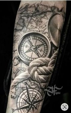 a man with a compass and rope tattoo on his arm