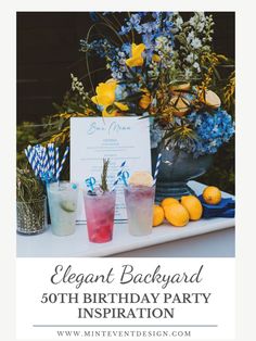 an elegant backyard birthday party with lemons, blue and yellow flowers and cocktails