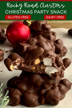 chocolate rocky road clusters are stacked on top of each other with an apple in the background