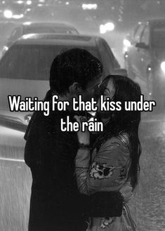 a couple kissing in the rain with text saying waiting for that kiss under the rain