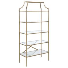 a gold metal shelf with glass shelves