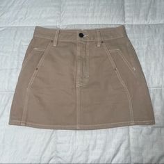 Brand New Without Tags!! Never Worn Before!! Beautiful Beige Color Skirt. Make An Offer!! I’m Open To Any Casual Brown Skort For Spring, Casual Brown Skort For Day Out, Casual Beige Skort, Brown Cotton Skort For Summer, Beige Casual Mini Skirt Relaxed Fit, Beige Relaxed Fit Casual Mini Skirt, Casual Beige Relaxed Fit Skort, Brown Cotton Mini Skirt For Summer, Cheap Beige Skirt With Button Closure