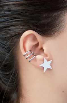 D E T A I L S These Star stud earrings are made of 18k Gold plated /White gold plated copper. These earrings are sold as a pair. The listing is only for the star earrings ( it does not include the cartilage cuff). S I Z E These earrings are approx 0.75x0.75 inch / 2x2 cm C A R E * I N S T R U C T I O N S Remove your jewelry before swimming, bathing, or exercising. Put on your jewelry after cosmetics, perfume, and lotions have been absorbed. Use a soft microfiber cloth to wipe your jewelry after Trendy Silver Ear Cuff With Matching Earrings, Trendy Silver Pierced Ear Cuff, Silver Star-shaped Ear Cuff As Gift, Silver Star-shaped Ear Cuff For Gift, Silver Star Shaped Ear Cuff As Gift, Silver Star Shaped Ear Cuff Gift, Silver Star-shaped Pierced Cartilage Earrings, Silver Star-shaped Cartilage Earrings With Pierced Design, Trendy Silver Ear Cuff With Ear Wire