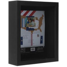 a black frame with an american flag and map on it