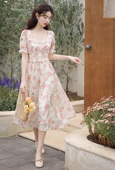 Get tea party ready this summer in this lightweight chiffon printed midi dress with a square neckline, braided details, short puff sleeves, flecks of gold and concealed back zipper. Lined. S: 33" chest, 27" waist, 44" lengthM: 34.5" chest, 28.5" waist, 44" lengthL: 36" chest, 30" waist, 44" length Chiffon Short Sleeve Dress For Garden Party, Beige Short Sleeve Chiffon Dress, Summer Beige Midi Dress With Square Neck, Casual Chiffon Square Neck Dress, Beige Square Neck Midi Dress For Summer, Casual Square Neck Chiffon Dress, Chiffon Midi Dress For Garden Party With Short Sleeves, Spring Chiffon Midi Dress With Puff Sleeves, Spring Chiffon Midi Dress With Square Neck