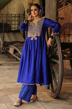 Blue anarkali, highlighted with zari dori, resham and tikkis embroidery on the yoke. Paired with a palazzo. - Aza Fashions Traditional Indigo Kurta With Pallu, Blue Tussar Silk Bollywood Sets, Designer Raw Silk Blue Dresses, Designer Blue Raw Silk Dress, Blue Raw Silk Saree Dress, Traditional Indigo Kurta With Traditional Drape, Traditional Blue Designer Dress, Blue Tussar Silk Sets For Wedding, Traditional Blue Chanderi Dress