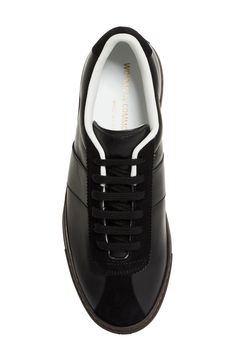 Goatskin suede adds contrasting tone and texture at the lacing cage, toe and heel on this sleek low-top sneaker crafted from smooth calfskin leather and stamped in gold with its ID. Lace-up style Leather upper and lining/rubber sole Made in Italy Designer Shoes Luxury Rubber Heel Cap Lace-up Sneakers, Luxury Lace-up Sneakers With Rubber Heel Cap, Luxury Low-top Custom Sneakers With Rubber Heel Cap, Luxury Patent Leather Low-top Sneakers, Luxury Low-top Patent Leather Sneakers, Classic Low-top Patent Leather Sneakers, Luxury Sneakers With Rubber Heel Cap And Round Toe, Modern Custom Sneakers With Leather Sole, Designer Patent Leather Sneakers With White Sole