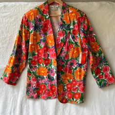 So Cool!! Brand New, Deadstock, Tags Attached! Vintage, Women's Jacket, Cathy Daniels, Floral, One Button, Pockets, Cuffed Sleeves, 100% Cotton, Shoulder Pads, Pink, Green, Purple, Vintage, Vintage Jacket, Floral Jacket, Floral Blazer, Jacket, Blazer, 80s, 80s Tyle, 80s Aesthetic, Floral, 80s Fashion, Vintage Blazer, Jacket, Cotton Jacket, Cotton Blaze, Vintage Cotton, Cotton, Oversized, Oversized Jacket Spring Cotton Blazer With Floral Print, Spring Cotton Floral Print Blazer, Spring Multicolor Cotton Blazer, Spring Floral Print Cotton Blazer, Vintage Floral Print Blazer For Spring, Multicolor Floral Print Blazer For Spring, Pink Long Sleeve Blazer With Floral Print, Vintage Multicolor Blazer For Spring, Spring Vintage Multicolor Blazer