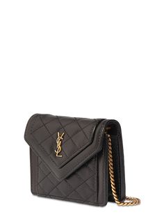 Height: 10cm Width: 8cm Depth: 2.5cm. Metal chain strap. Front flap with snap button closure. Front gold-colored metal logo detail Versace Brand, Ski Accessories, Chain Wallet, Loafer Mules, Black Shoulder Bag, Wallet Chain, Metal Logo, Heeled Loafers, Leather Chain